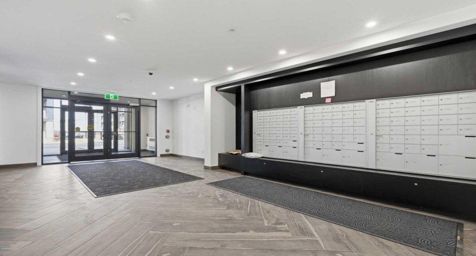 Welcoming main entrance leading to a modern and well-maintained lobby.