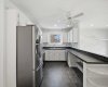 Central Kitchen between Living Room and Family Room