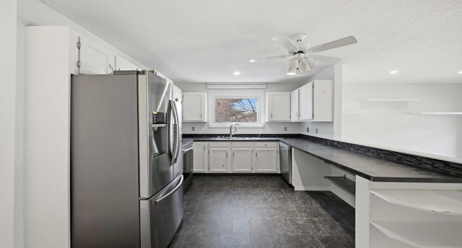 Central Kitchen between Living Room and Family Room