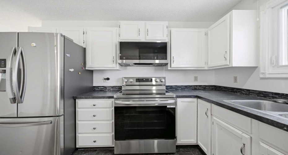 92 Whitlock Close, Calgary, Alberta T1Y 4X3, 4 Bedrooms Bedrooms, ,3 BathroomsBathrooms,Residential,For Sale,Whitlock,A2305994