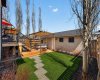 Grass greened up with AI.*Note garage roof is showing new shingles via AI to show what it will look like upon possession