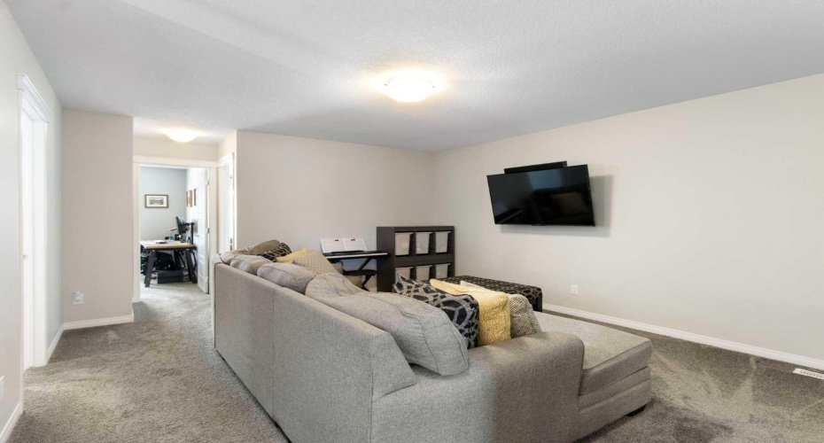 Upper level family room is a great place for the family to gather at the end of the day