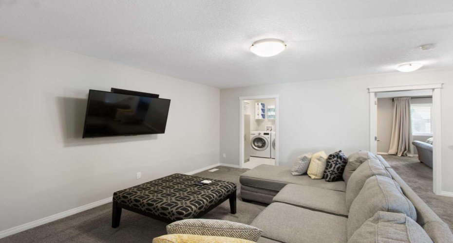 32 Wolf Creek Street, Calgary, Alberta T2X4V2, 4 Bedrooms Bedrooms, ,4 BathroomsBathrooms,Residential,For Sale,Wolf Creek,A2306273