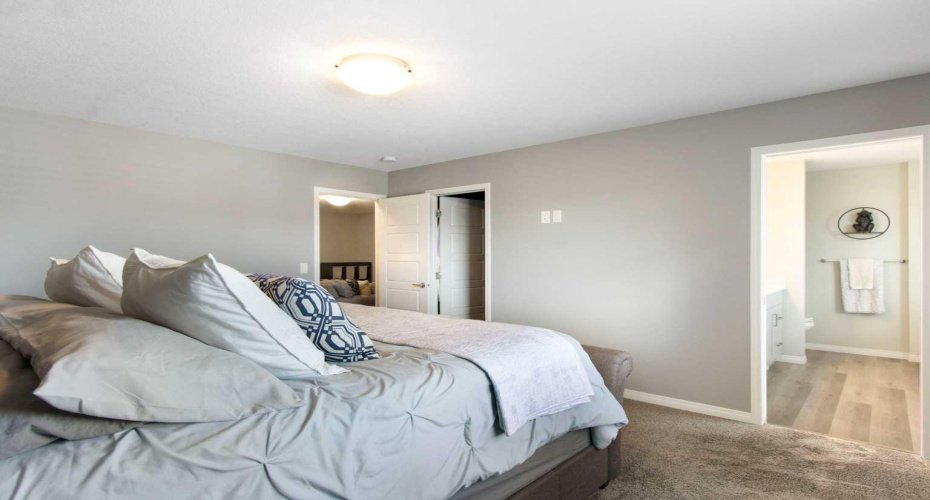 32 Wolf Creek Street, Calgary, Alberta T2X4V2, 4 Bedrooms Bedrooms, ,4 BathroomsBathrooms,Residential,For Sale,Wolf Creek,A2306273