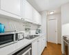 Kitchen with stainless steel appliances.