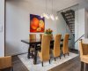 Dining area with views of the architectural staircase