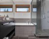 Oversized soaker tub, primary ensuite