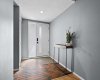 Foyer - Access to garage and half bathroom on this level