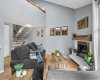 Living Room with Vaulted Ceiling and Loft above
