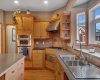 15 Rosery Drive, Calgary, Alberta T2K 1L4, 4 Bedrooms Bedrooms, ,5 BathroomsBathrooms,Residential,For Sale,Rosery,A2305362
