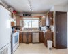 116 Dovercrest Way, Calgary, Alberta T2B 2L9, 3 Bedrooms Bedrooms, ,2 BathroomsBathrooms,Residential,For Sale,Dovercrest,A2305455
