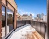 This oversized balcony offers spectacular views of downtown Calgary.