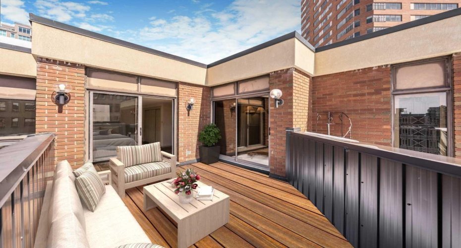 Virtually staged for inspiration, showcasing access to the second south-facing balcony.