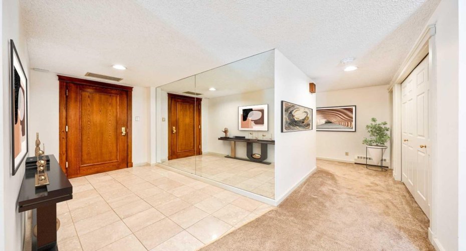 You are welcomed by a generous foyer with plenty of room for coats & shoes. Virtually staged for inspiration.