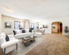 Virtually staged for inspiration, this large living & dining room offers an inviting space perfect for entertaining.