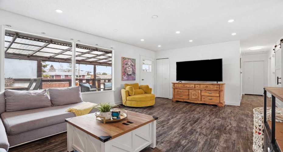 Living room, with covered patio through rear entrance
