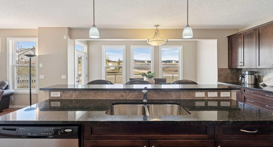 Enjoy the beautiful landscape behind your home as you enjoy a coffee on your back deck