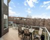 Updated deck with glass railing and vinyl decking