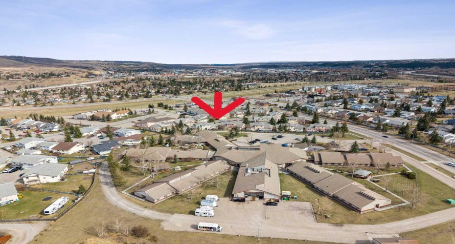 26 Quigley Drive, Cochrane, Alberta T4C 1M2, 2 Bedrooms Bedrooms, ,3 BathroomsBathrooms,Residential,For Sale,Quigley,A2305379