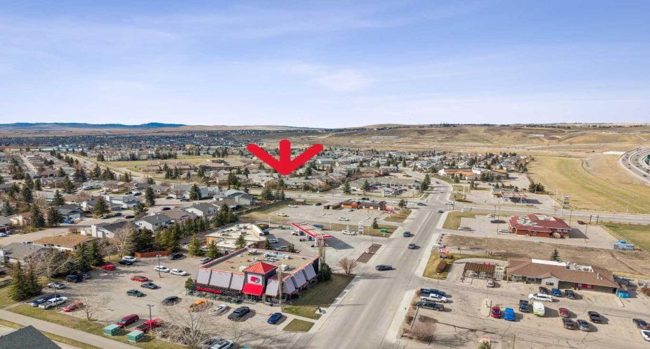 26 Quigley Drive, Cochrane, Alberta T4C 1M2, 2 Bedrooms Bedrooms, ,3 BathroomsBathrooms,Residential,For Sale,Quigley,A2305379