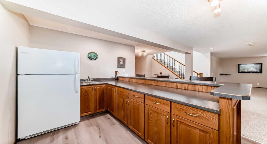 The wet bar will make a great place for entertaining family & friends!
