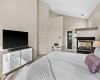 Primary retreat with vaulted ceilings.