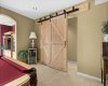 Private 'wing' to two additional versatile bedrooms and full bath.