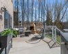 Large lower level patio with wood burning fireplace