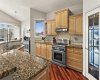 Chef's kitchen with stainless steel Thermadore appliances and solid maple cabinetry.
