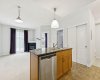 open layout viewing from kitchen into unit