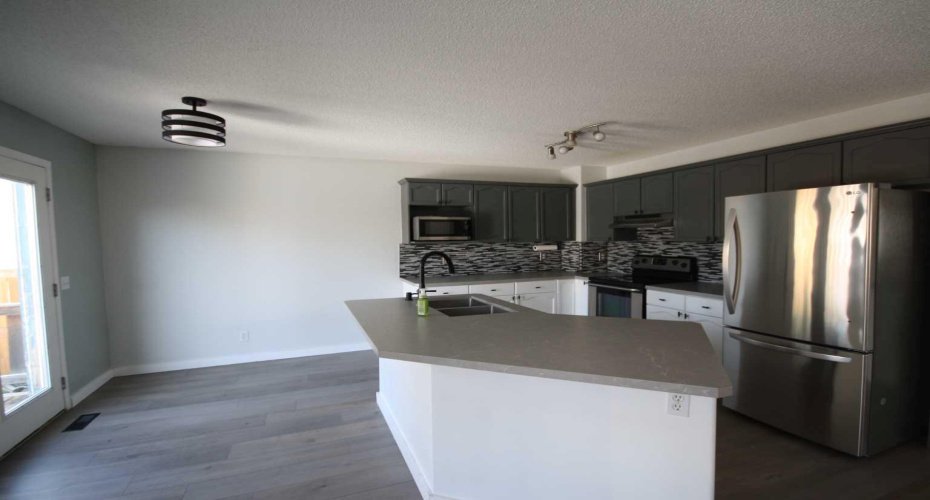 309 Bridleridge Way, Calgary, Alberta T2Y 4M5, 3 Bedrooms Bedrooms, ,2 BathroomsBathrooms,Residential,For Sale,Bridleridge,A2303250