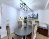 Dinner parties just got an upgrade. The dining space easily accommodates your guests before the evening inevitably spills into the living room below.