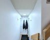 The lower level transition. Forget tiny front-door closets; this is a dedicated drop zone for your active Lakeview lifestyle.