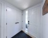 he main floor entry. Clean, bright, and welcoming with ample closet space to stash your everyday gear before stepping into the volume of the home.