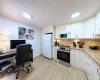 The kitchen doesn't just cook; it works. Room for a dedicated desk space perfect for managing the household or grabbing a quick email over morning coffee or put a breakfast nook here and share your morning looking out the window