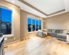 The spacious bonus room features east-facing windows that bring in abundant morning sunlight...