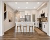 A bright and central kitchen, perfect for entertaining! -Virtually staged for illutration purposes. Decor & furniture not included.