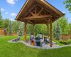 Gather with family and friends beneath the beautiful timber-frame gazebo, a standout feature that creates the perfect setting for conversations, celebrations, and peaceful evenings outdoors.
