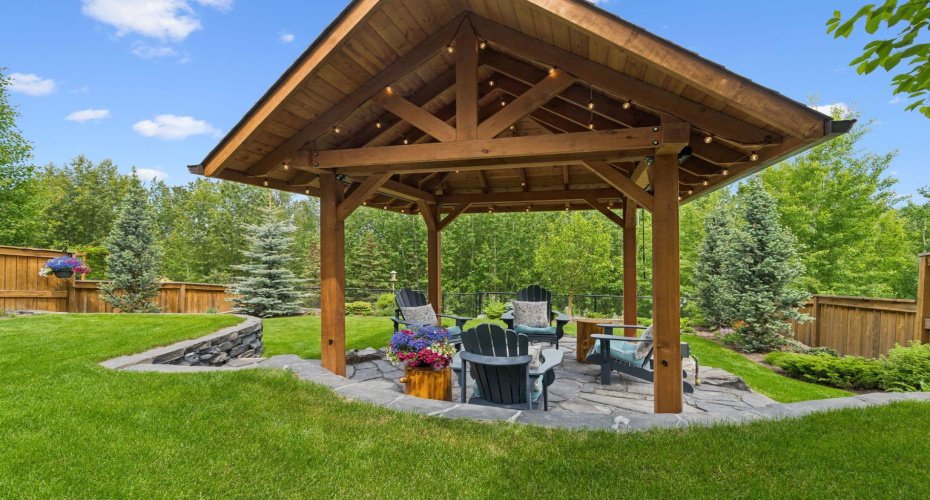 Gather with family and friends beneath the beautiful timber-frame gazebo, a standout feature that creates the perfect setting for conversations, celebrations, and peaceful evenings outdoors.
