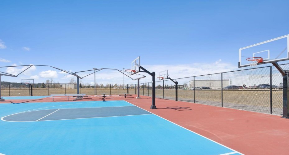 Outdoor basketball courts are for the members of spray lakes enjoyment. They also offer outdoor pickleball courts, perfect for those summer days