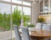 Enjoy every meal with a view. The dining area captures picturesque vistas of the Bow River valley, creating an inspiring backdrop for morning coffee, family dinners, and gatherings with friends.