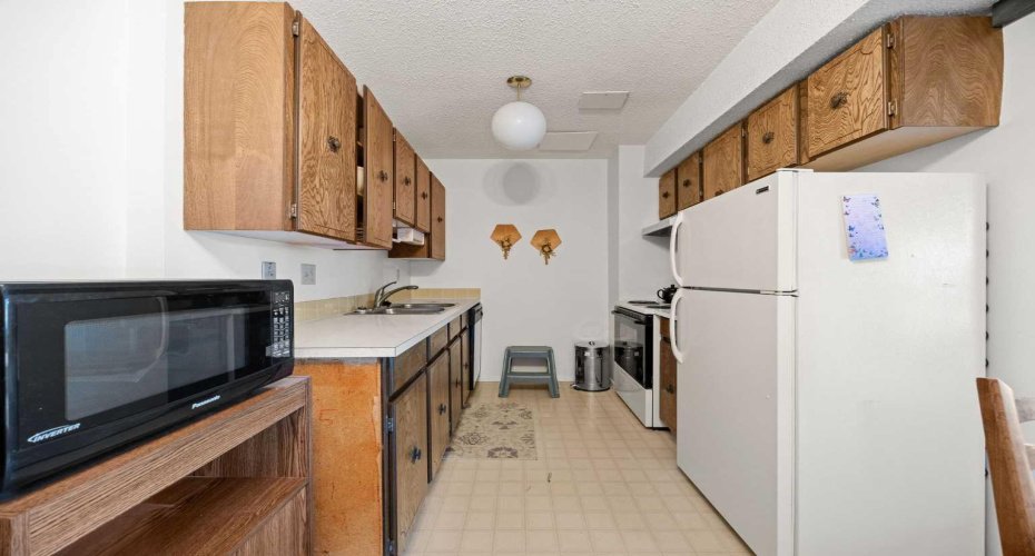 4940 39 Avenue, Calgary, Alberta T3E 6M7, 2 Bedrooms Bedrooms, ,1 BathroomBathrooms,Residential,For Sale,39,A2310774