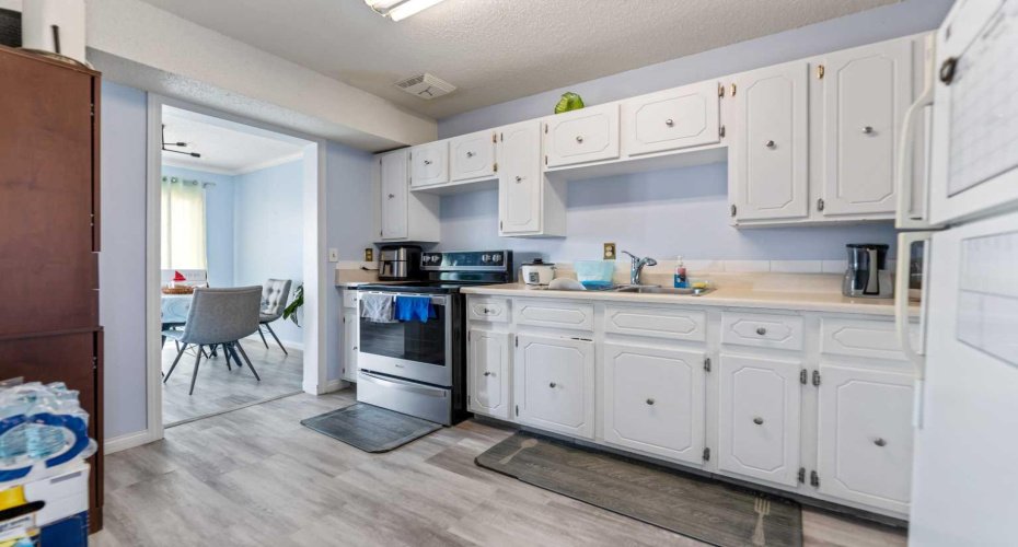3029 Rundleson Road, Calgary, Alberta T1Y 3Z5, 3 Bedrooms Bedrooms, ,2 BathroomsBathrooms,Residential,For Sale,Rundleson,A2310203