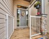 Covered front porch handy to visitors and deliveries.