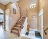 Big open foyer and grand stairwell.