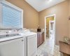 Great utility with this mudroom / laundry room.