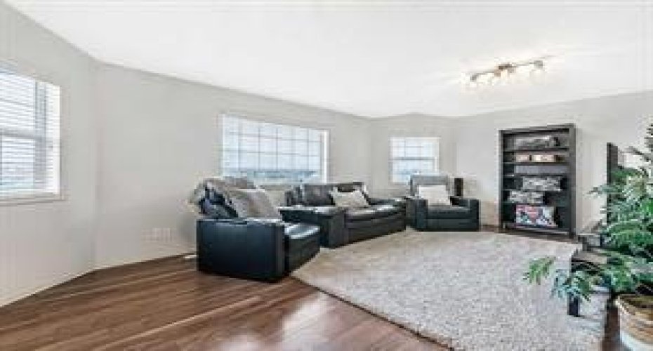 Featuring a bright, generous BONUS room on the upper level