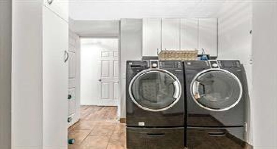 Modern main floor washer dryer pair