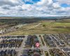 145 Heartland Way, Cochrane, Alberta T4C 0M5, 3 Bedrooms Bedrooms, ,3 BathroomsBathrooms,Residential,For Sale,Heartland,A2313047
