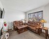 Oversized windows bring in the natural light to this space creating a warm and open atmosphere